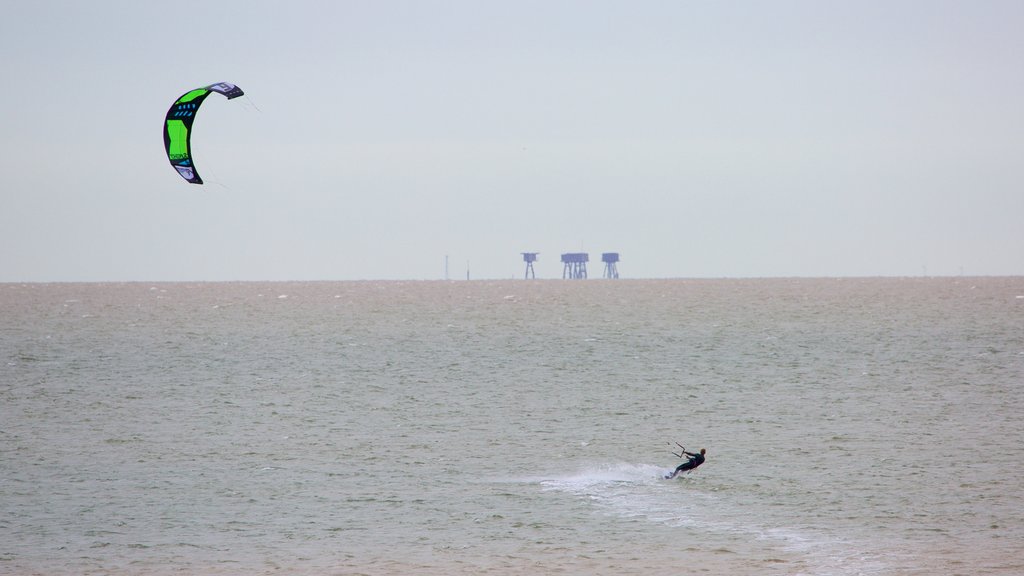 Whitstable Beach which includes general coastal views and kite surfing