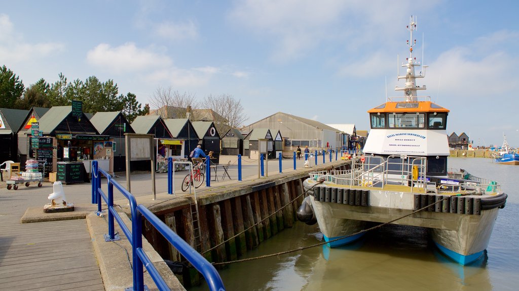 Whitstable Harbour featuring a bay or harbour and markets