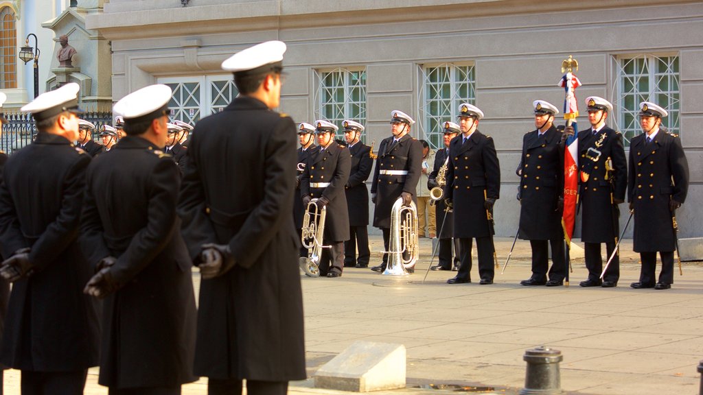 Punta Arenas showing military items as well as a small group of people