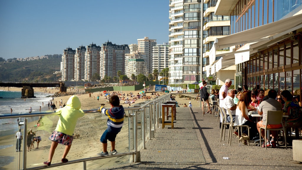 Acapulco Beach showing a sandy beach, outdoor eating and a city