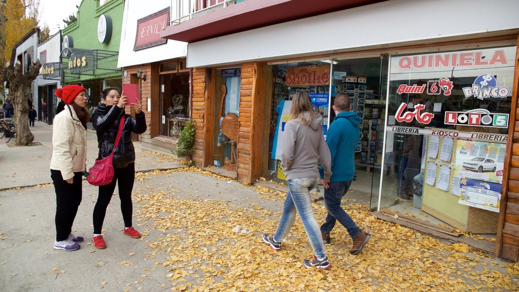 El Calafate showing city views as well as a small group of people