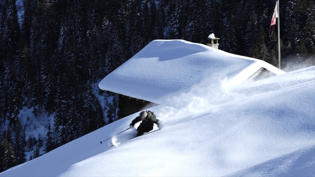 Verbier Ski Resort showing snow and snow skiing as well as an individual male