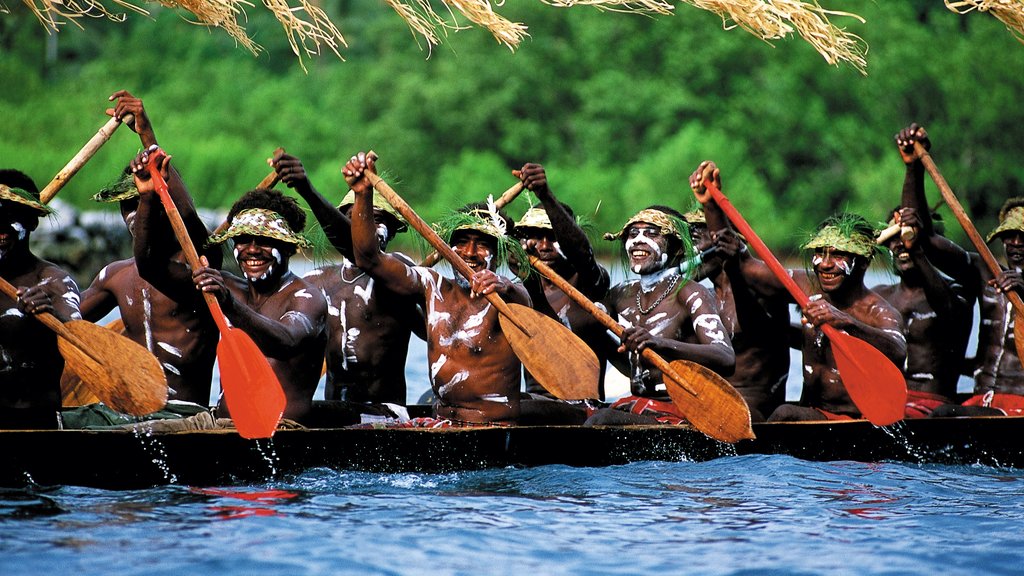 Ilhas Salomão caracterizando cultura nativa e caiaque ou canoagem assim como um grande grupo de pessoas