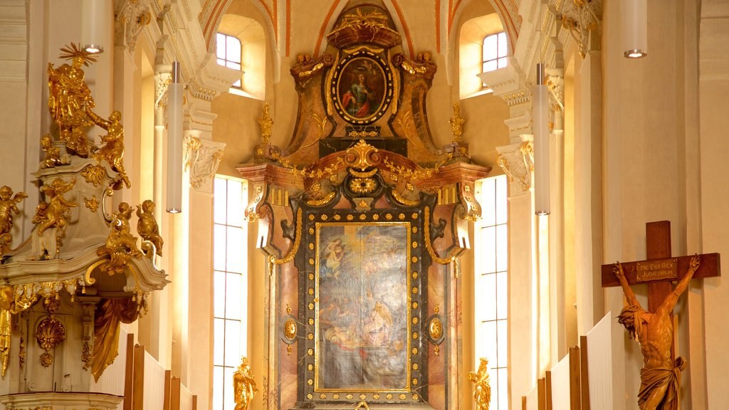 Ceske Budejovice which includes a church or cathedral, interior views and religious elements