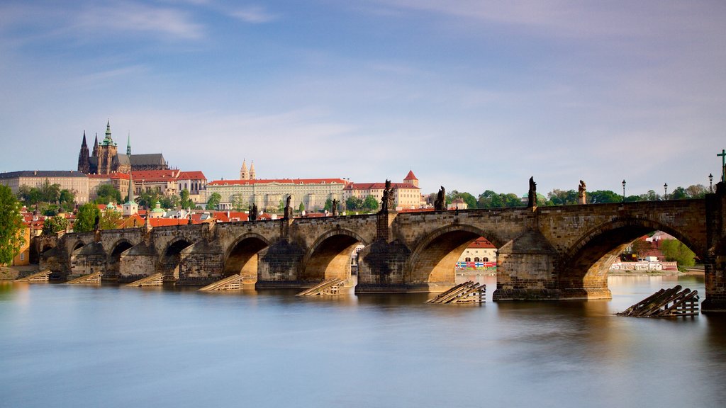 Charles Bridge featuring a bridge, a river or creek and a city