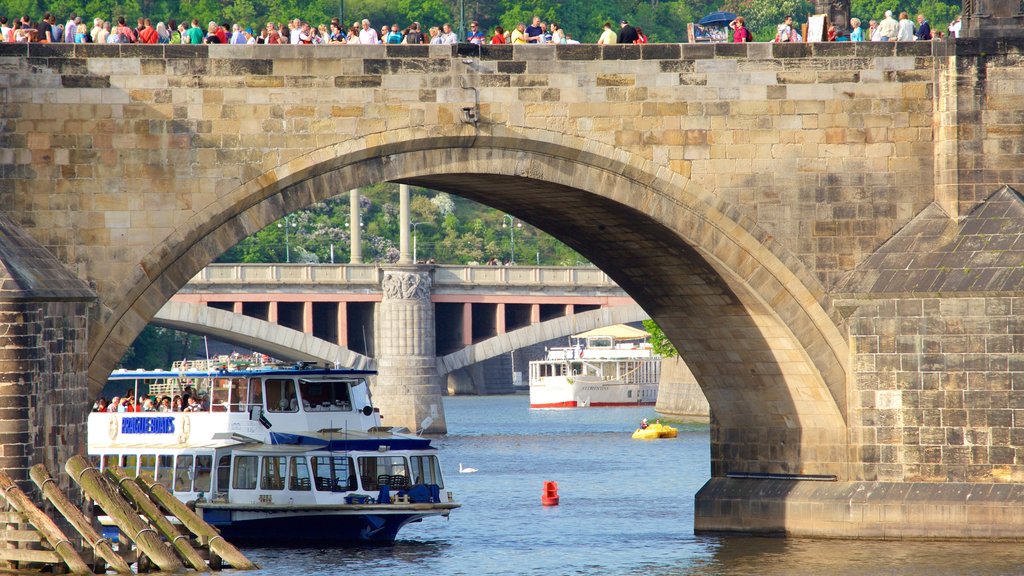 Charles Bridge showing a river or creek, a bridge and boating