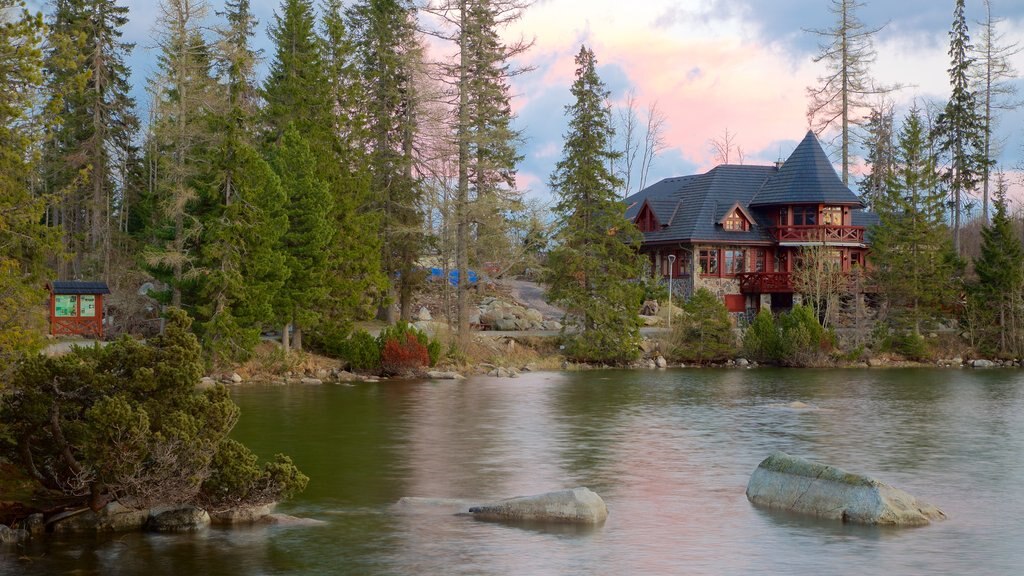 Strbske Pleso which includes a lake or waterhole and a house