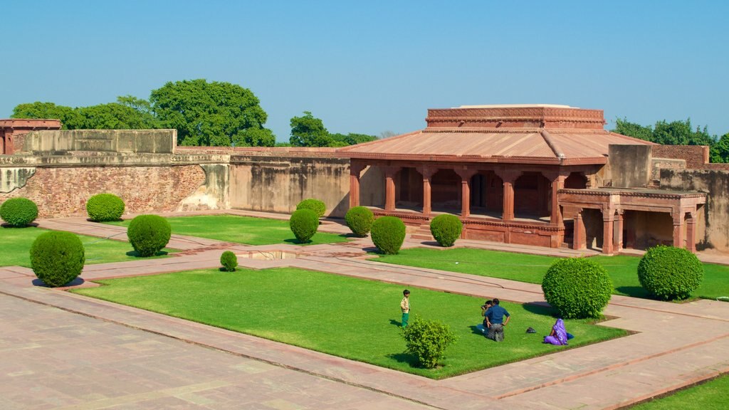 Fatehpur Sikri which includes a temple or place of worship, a square or plaza and a park