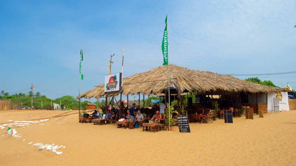 Praia de Candolim – Forte Aguada que inclui uma praia, um bar na praia e paisagens litorâneas