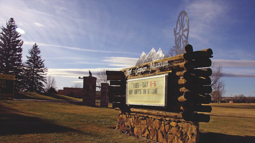 Casper showing tranquil scenes, a sunset and signage