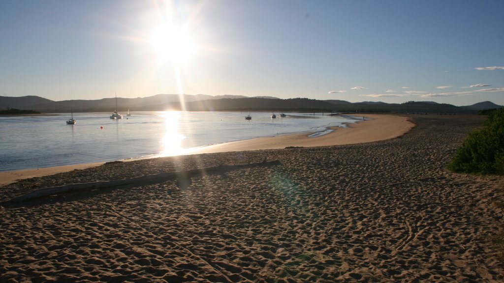 Port Sorell which includes a sandy beach, general coastal views and a sunset