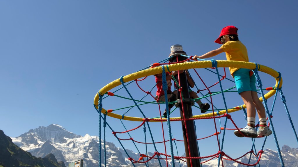 Lauterbrunnen showing a playground as well as children