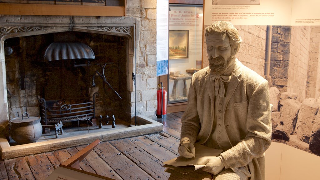 Westgate Museum showing a statue or sculpture and interior views