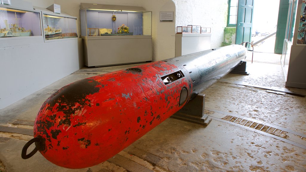 Nothe Fort featuring interior views and military items