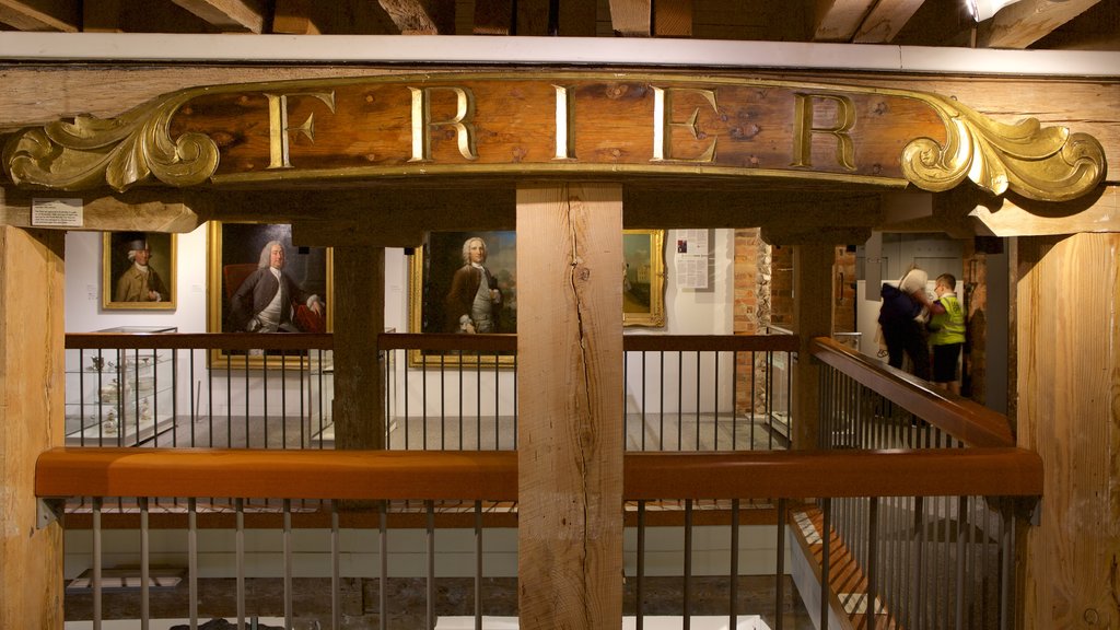 Poole Museum featuring signage and interior views