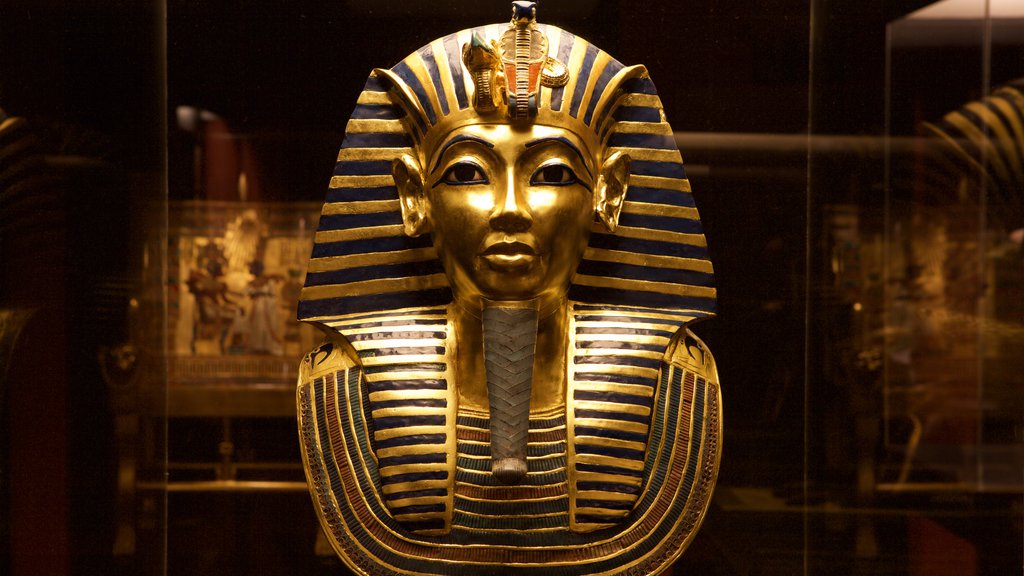 Tutankhamun Exhibition mostrando elementos del patrimonio y una estatua o escultura