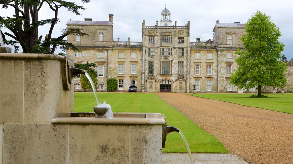 Wilton House showing a fountain, a house and heritage architecture