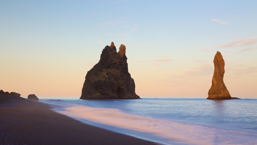 Reynisdrangar showing a beach and a sunset