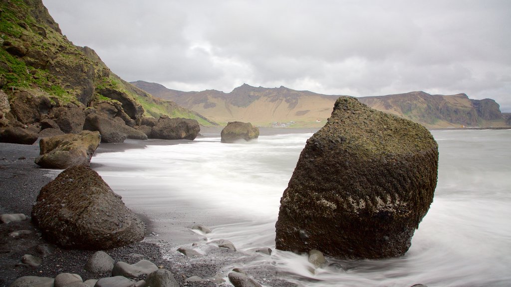 Black Beach featuring rocky coastline