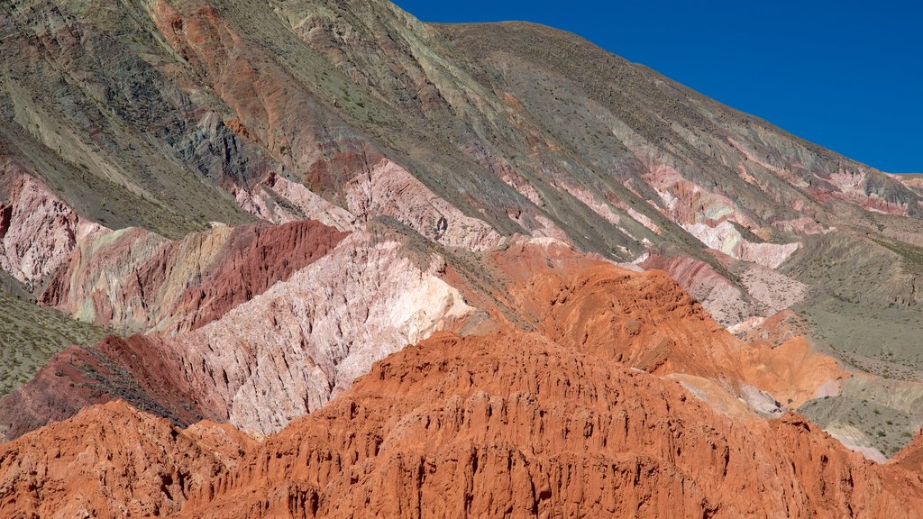 Purmamarca which includes mountains and desert views