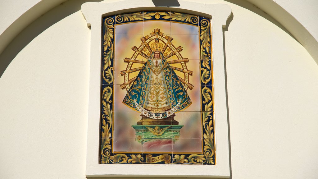 Puerto Madryn featuring religious elements and art