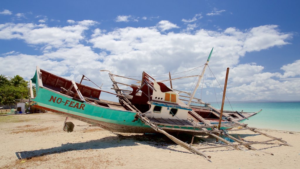 Santa Fe que incluye vistas generales de la costa y una playa de arena