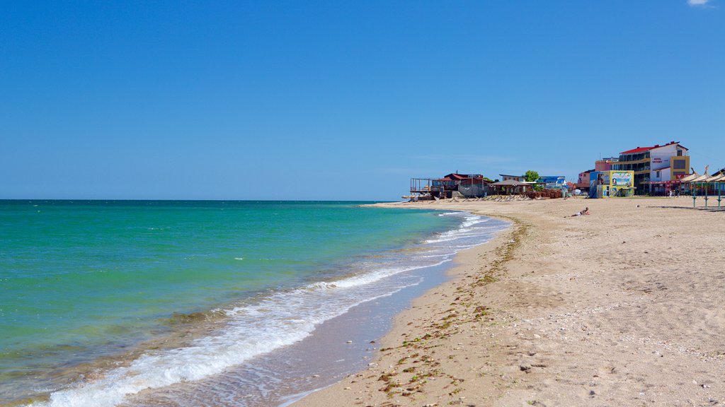 Vama Veche which includes a sandy beach and general coastal views