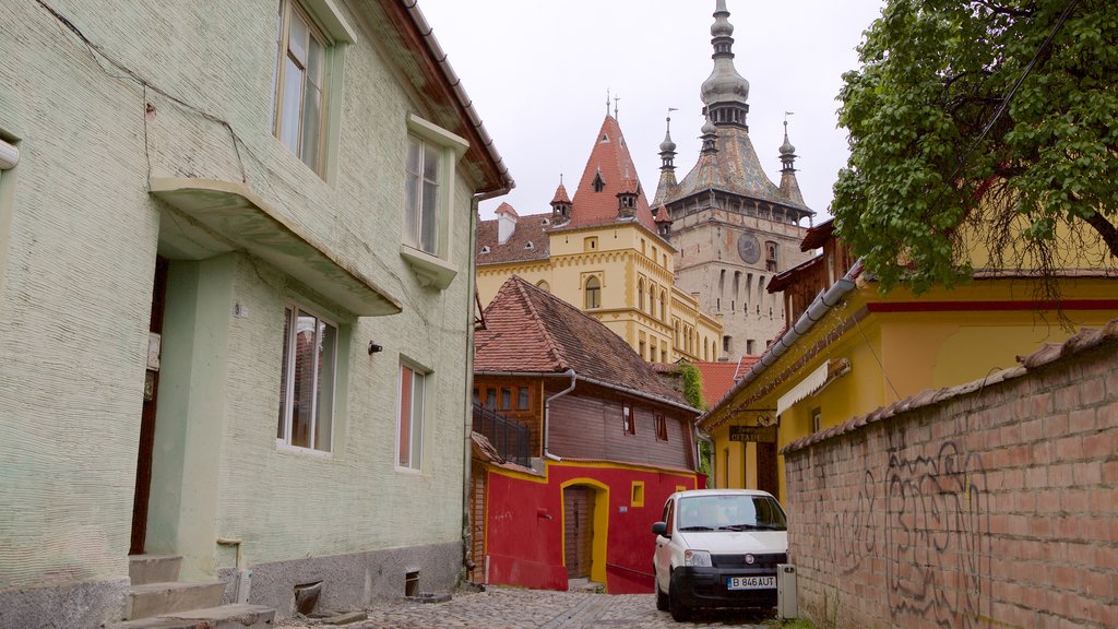 Clock Tower featuring a house and heritage architecture