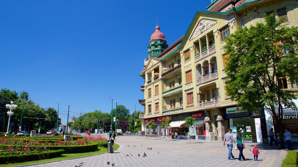 Piata Operei which includes heritage architecture and a garden