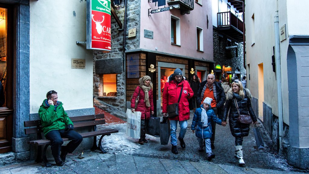 Courmayeur which includes street scenes as well as a family