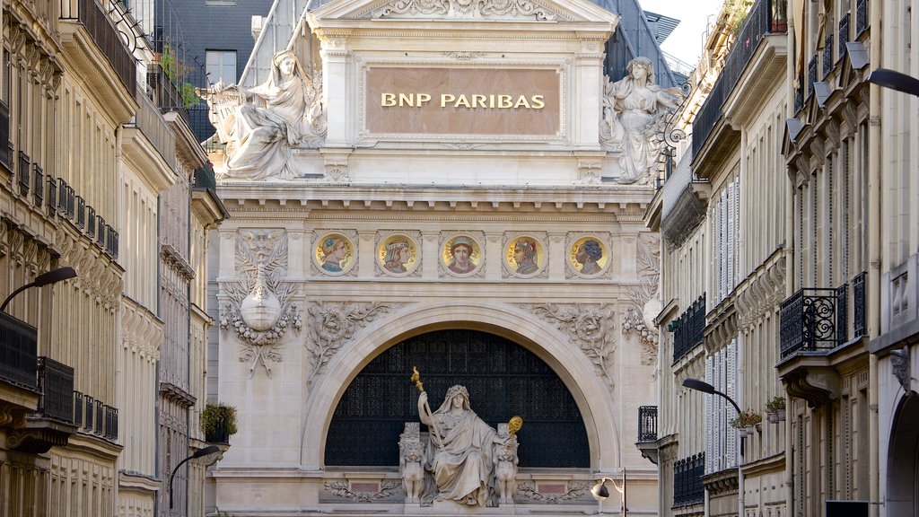 Grands Boulevards featuring signage, an administrative buidling and heritage architecture