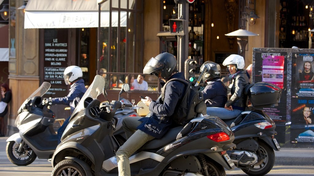 Grands Boulevards which includes motorbike riding as well as a small group of people