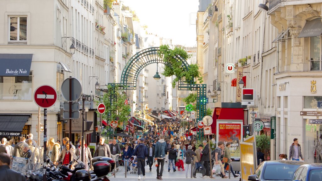 2nd Arrondissement featuring markets and street scenes as well as a large group of people