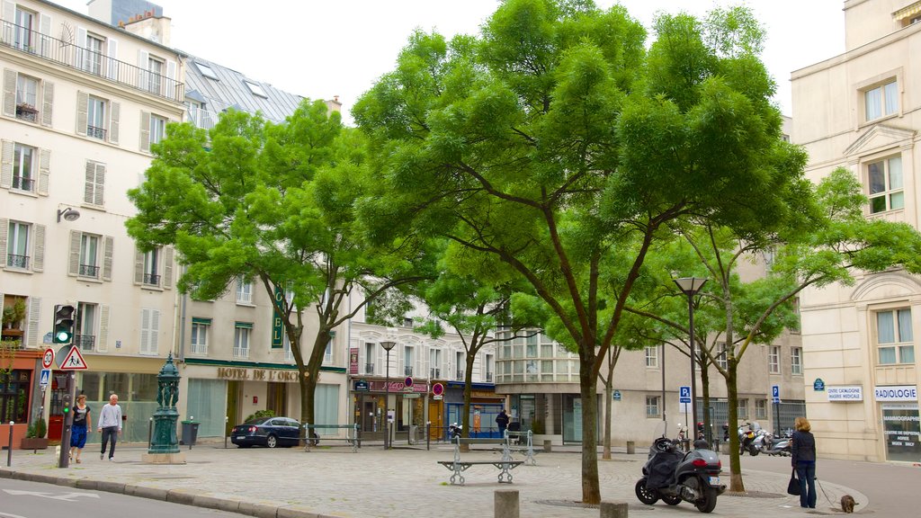 14th Arrondissement showing a city and street scenes