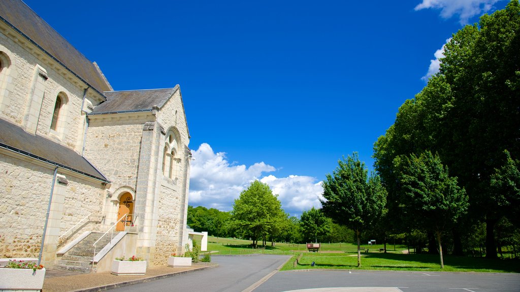 Saint-Benoit-sur-Loire featuring a garden and a church or cathedral