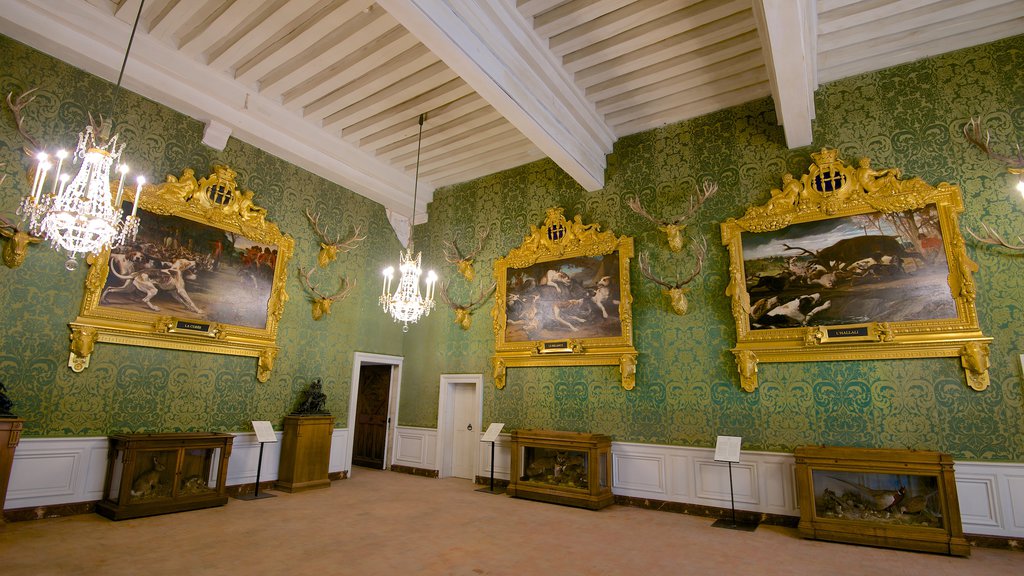 Chateau de Chambord showing art, a castle and interior views