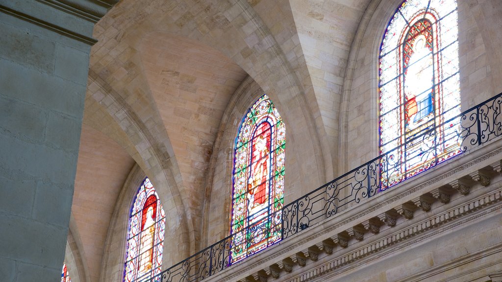 Notre Dame Church featuring art, interior views and a church or cathedral