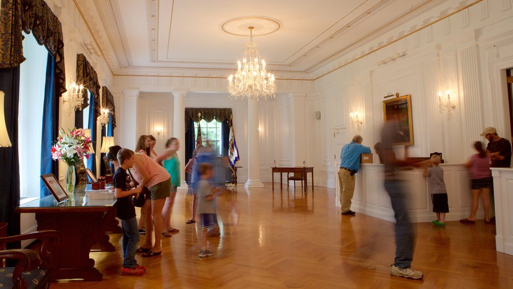 West Virginia State Capitol Building featuring interior views and an administrative building as well as a small group of people