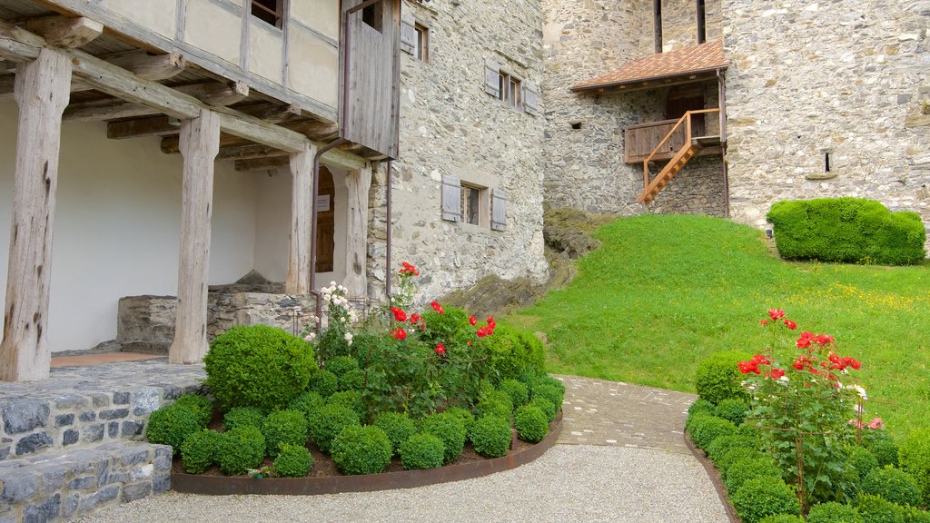 Liechtenstein ofreciendo elementos del patrimonio, flores y castillo o palacio