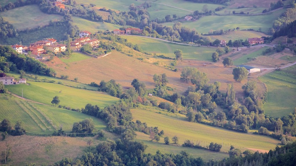 San Marino showing a small town or village, farmland and tranquil scenes