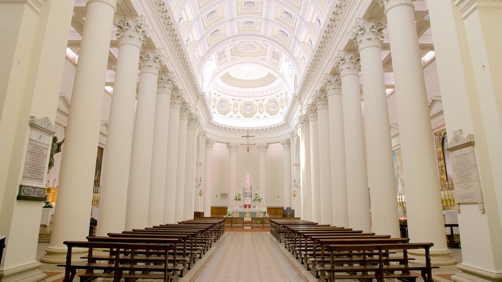 Basilica of Saint Marino featuring a church or cathedral, religious elements and interior views