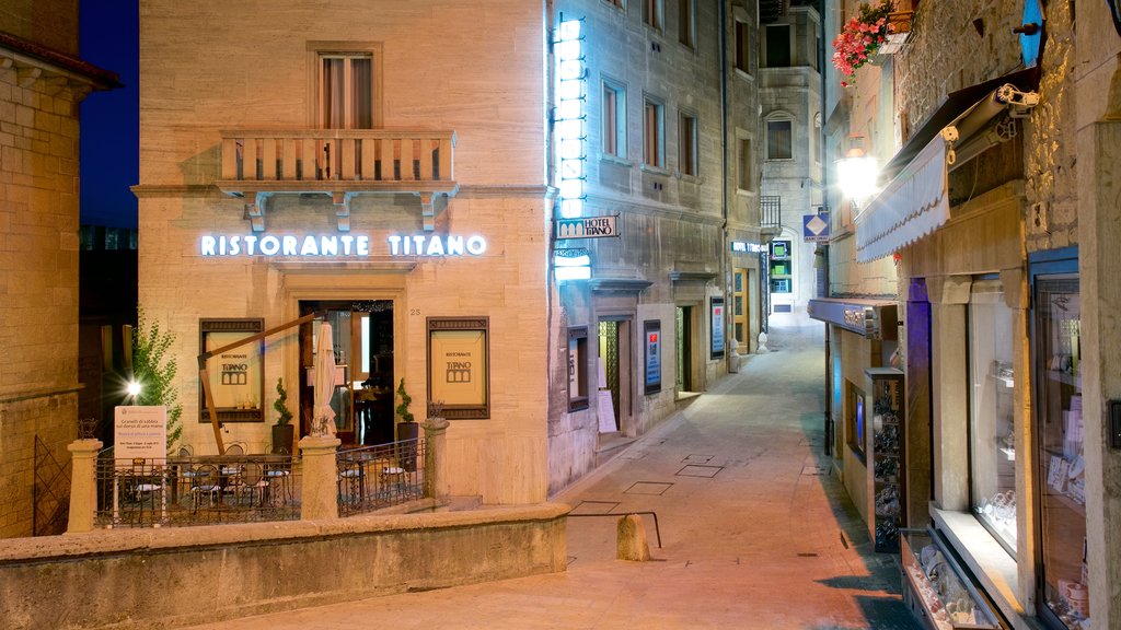 Piazza del Titano featuring signage, street scenes and night scenes