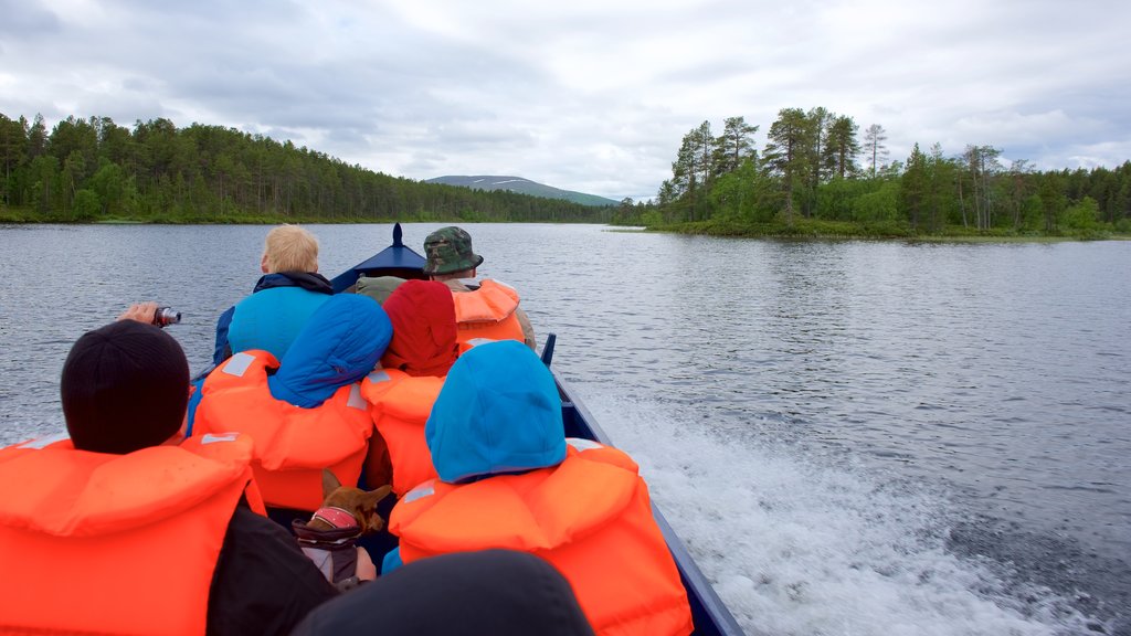 Lemmenjoki National Park showing tranquil scenes, kayaking or canoeing and a river or creek