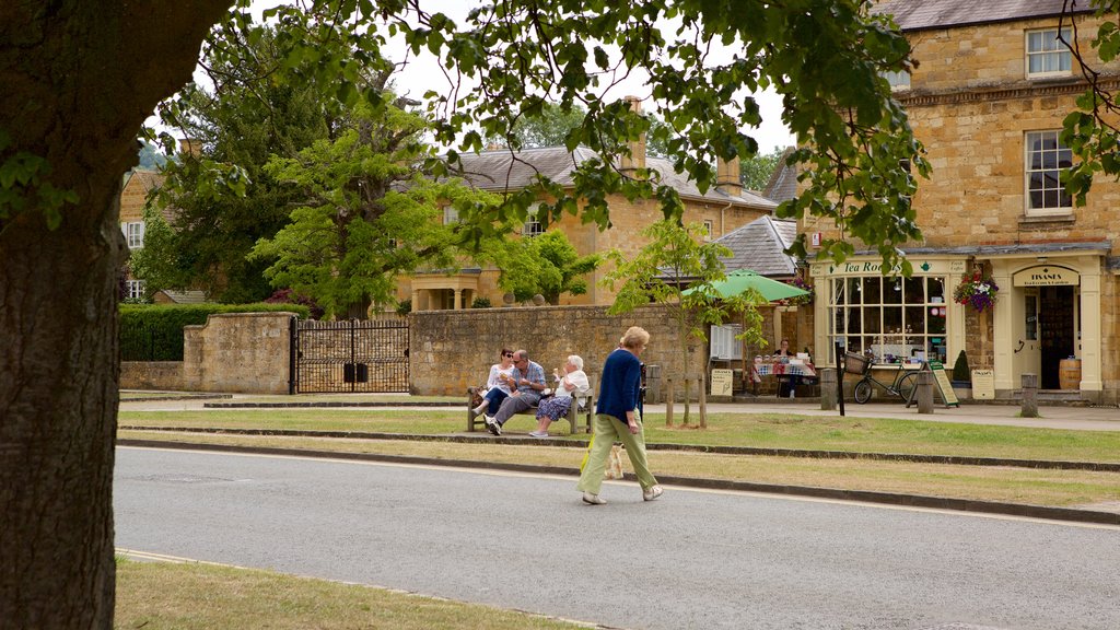 Broadway which includes street scenes as well as a small group of people