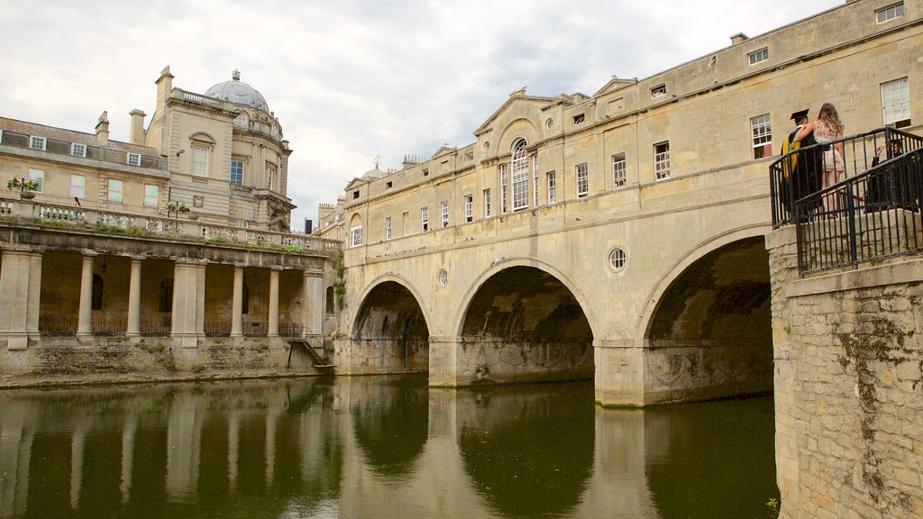 Pulteney Bridge featuring a city, a bridge and heritage architecture