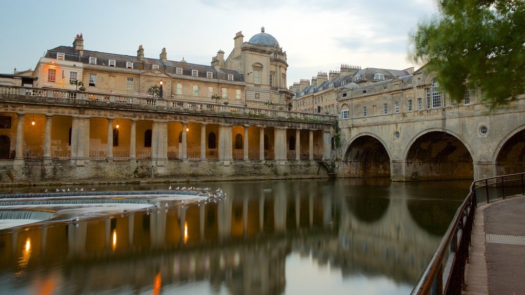 Pulteney Bridge featuring a river or creek, heritage elements and a city