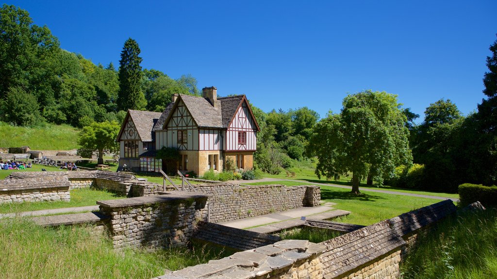 Chedworth Roman Villa showing heritage elements, a pond and a house