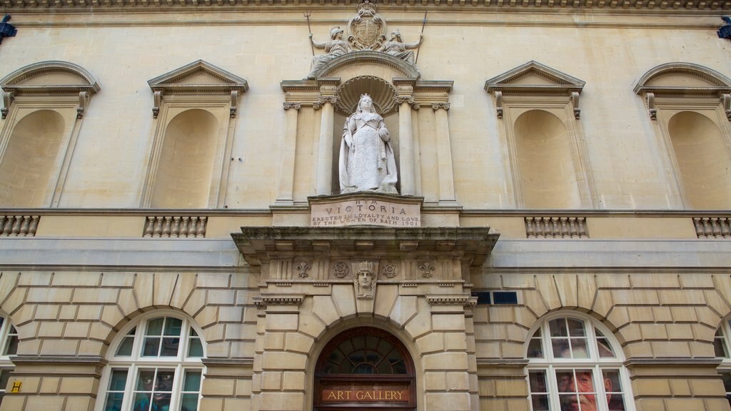 Victoria Art Gallery ofreciendo patrimonio de arquitectura, señalización y una estatua o escultura