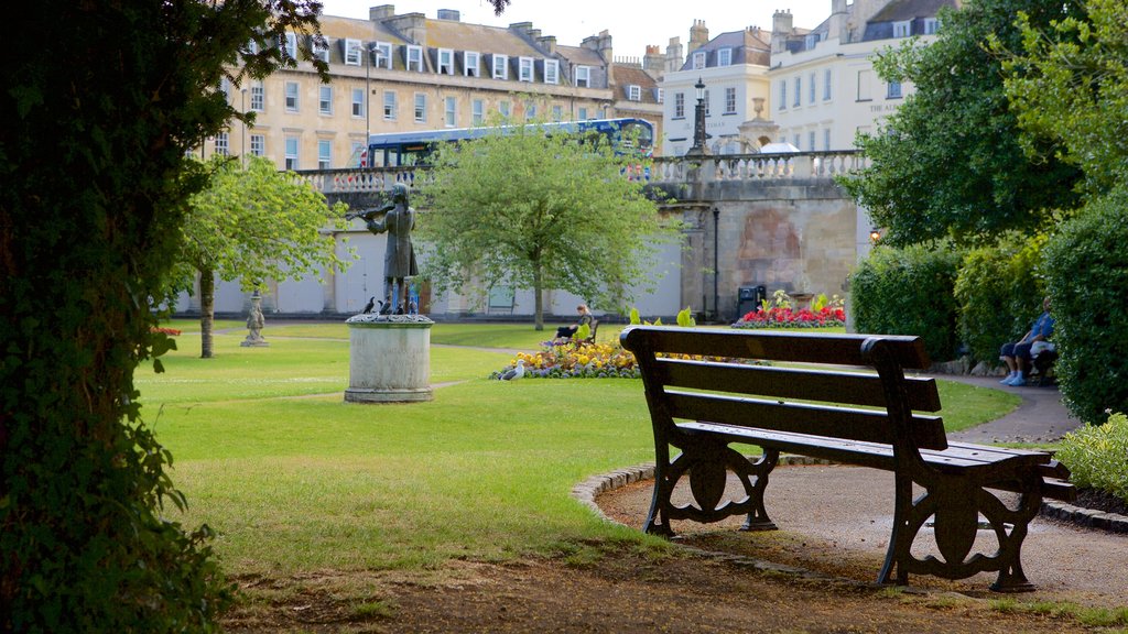 Parade Gardens showing flowers, a statue or sculpture and a park