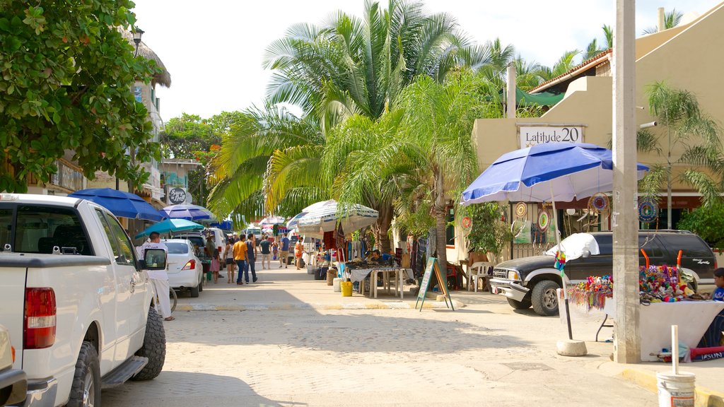 Sayulita which includes street scenes and a coastal town